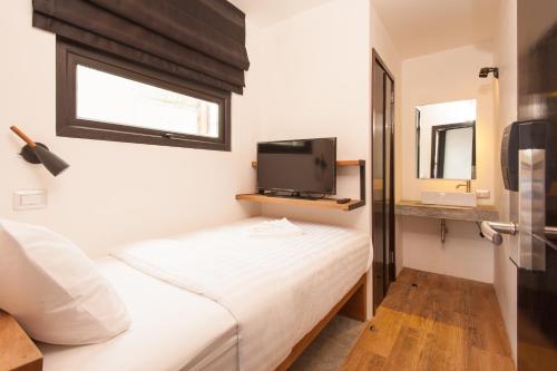 Кровать или кровати в номере Indie Hostel - Koh Tao