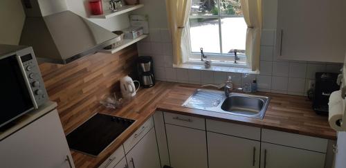 Kuchyň nebo kuchyňský kout v ubytování Vakantiewoning "Aan het Bosje" ZOUTELANDE - Strand 200m !