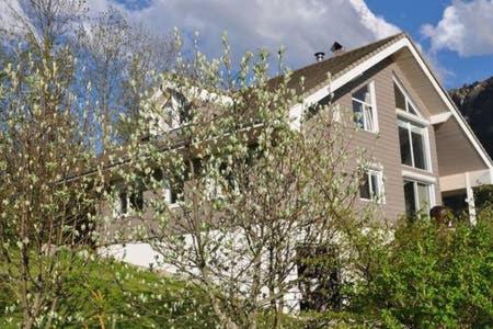 a large house with trees in front of it at le montanet in Thollon