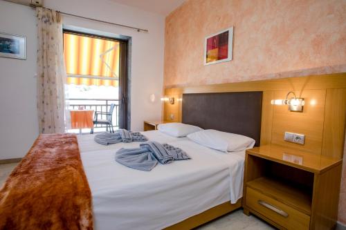 Maik Apartmentsにあるベッド
