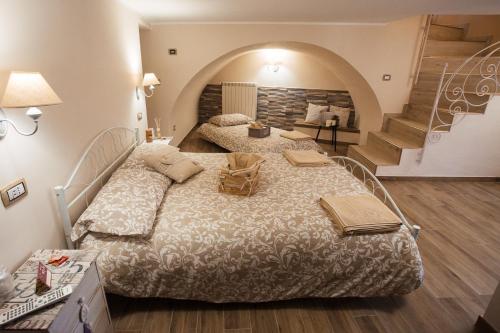 Posteľ alebo postele v izbe v ubytovaní Alle Scalette B&B