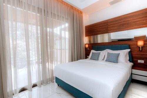 Кровать или кровати в номере Elite Luxury Villas