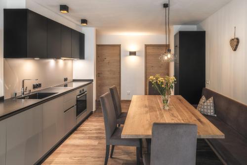 Kuchyň nebo kuchyňský kout v ubytování Chalet Albric