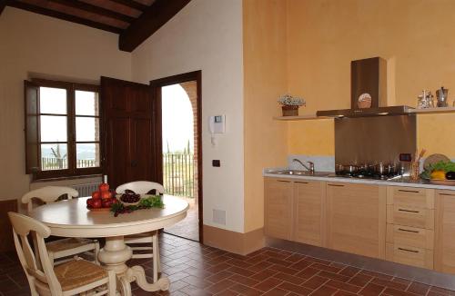 Kuchyň nebo kuchyňský kout v ubytování Relais Poggio al Vento