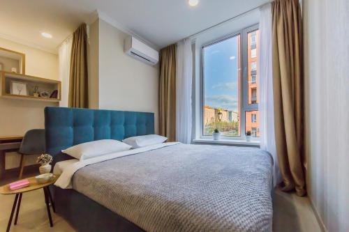 Ένα ή περισσότερα κρεβάτια σε δωμάτιο στο Comfort Town Love Home
