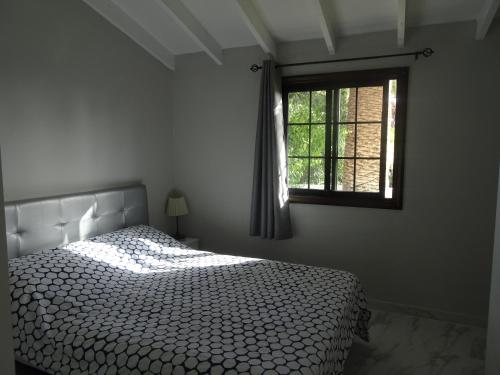 Кровать или кровати в номере Appartamento Indipendente Piano Terra in Villa - Golf Del Sur