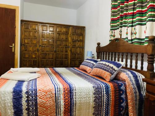 Postel nebo postele na pokoji v ubytování Barranco de la Salud