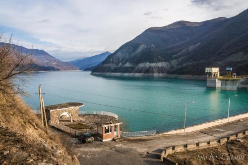 a view of a large body of water with a dam at AIA Apartment in Kutaisi