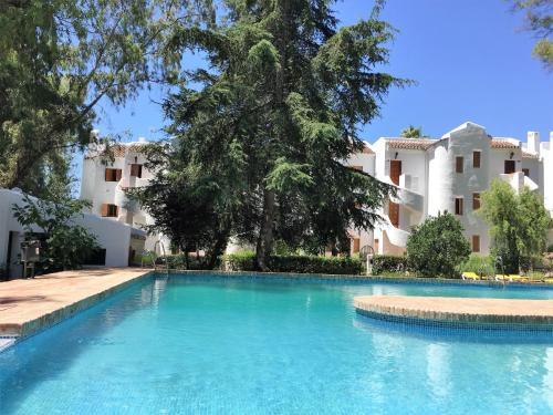 Bazén v ubytování Nueva Andalucia - Penthouse nebo v jeho okolí