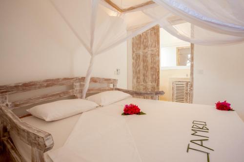 Ένα ή περισσότερα κρεβάτια σε δωμάτιο στο Swordfish Villas