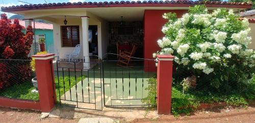 a gate in front of a house at Casa Tania Fernandez in Viñales