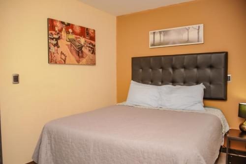 Posteľ alebo postele v izbe v ubytovaní Apartamentos en el Poblado