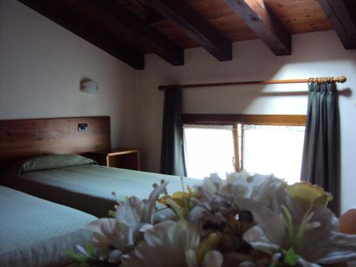 Tempat tidur dalam kamar di Agriturismo Sant' Anna