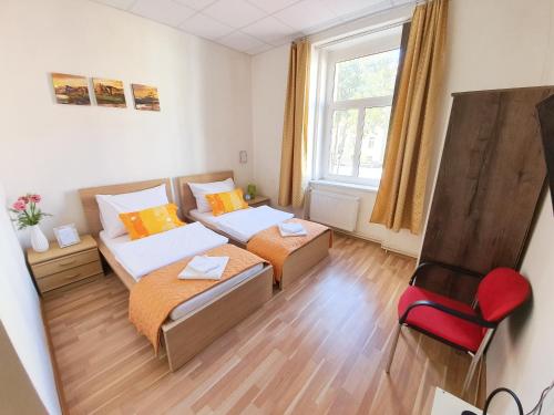 Cama o camas de una habitación en KK Apartments