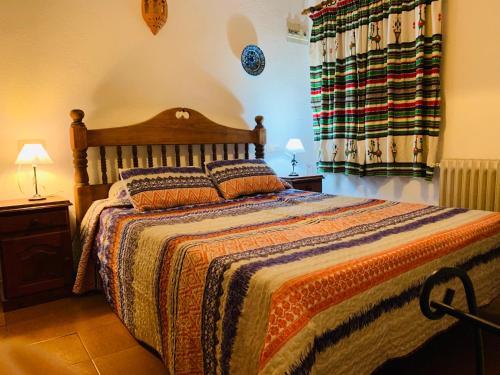Postel nebo postele na pokoji v ubytování Barranco de la Salud