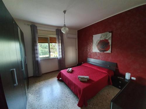 מיטה או מיטות בחדר ב-Villa Capriccio
