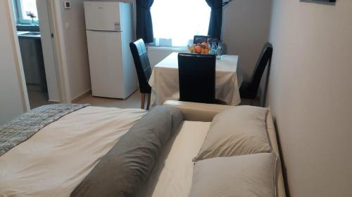 Ένα ή περισσότερα κρεβάτια σε δωμάτιο στο Apartament Saguna