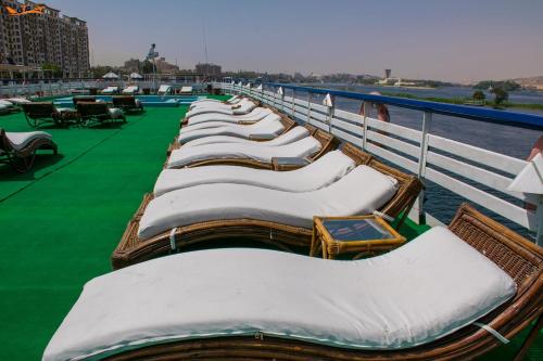 a row of beds on a cruise ship at GTS Nile Cruise Luxor Aswan every monday from Luxor friday from Aswan in Luxor
