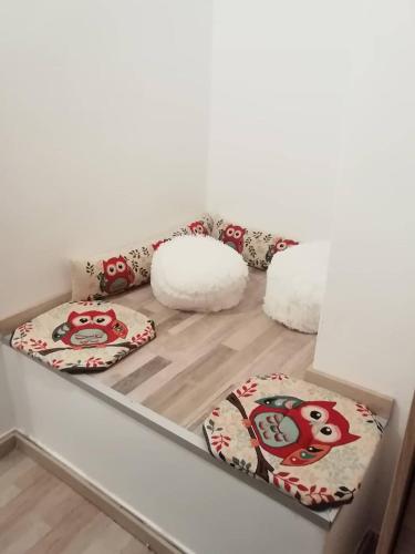 a group of pillows sitting on a table at Sky line center city F in Aígio