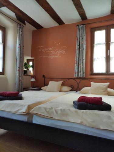 Ліжко або ліжка в номері Gutsherrenhaus