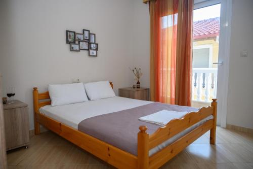 Postel nebo postele na pokoji v ubytování Anastasios Room's