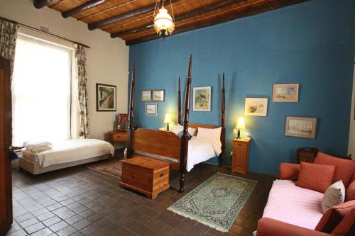Ένα ή περισσότερα κρεβάτια σε δωμάτιο στο Wittedrift Manor House