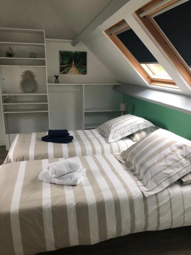 Postel nebo postele na pokoji v ubytování Le gîte de la mongatelais