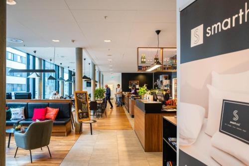 a view of the lobby of a restaurant at Smarthotel Tromsø in Tromsø