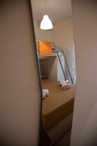 Postel nebo postele na pokoji v ubytování B&B Miramare Suite