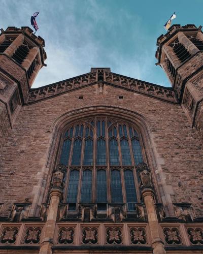 a tall building with a large window on it at Adelaide Paringa in Adelaide