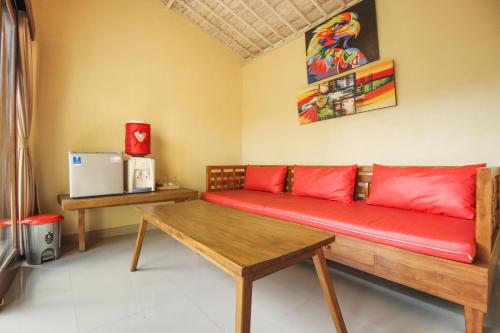 Pondok Kutuh Guest House tesisinde bir oturma alanı