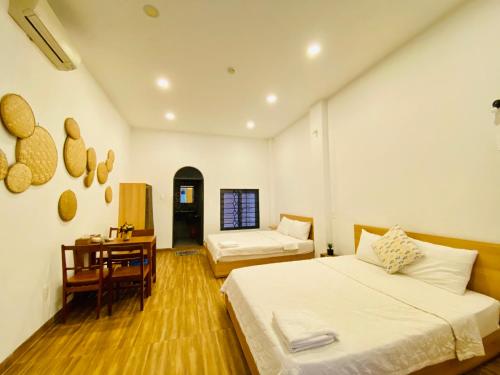 Giường trong phòng chung tại Vitamin Sea Homestay Nha Trang