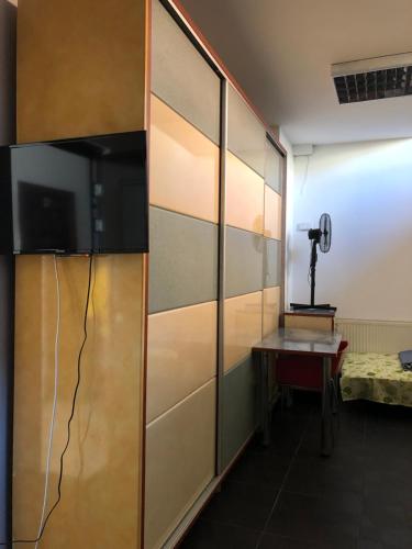 Postel nebo postele na pokoji v ubytování Pipera Park Studios