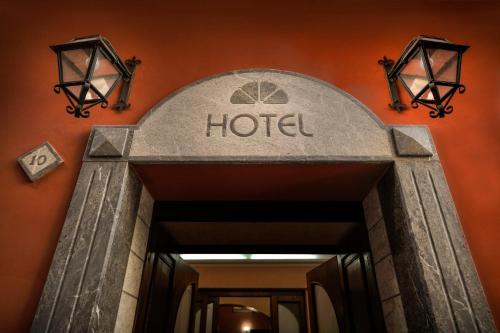 a hotel sign over the entrance to a hotel at Hotel Piccolo in Termini Imerese