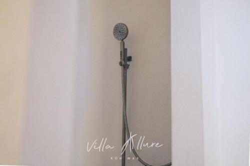 a shower in the corner of a room at Villa Allure Koh Mak in Ko Mak