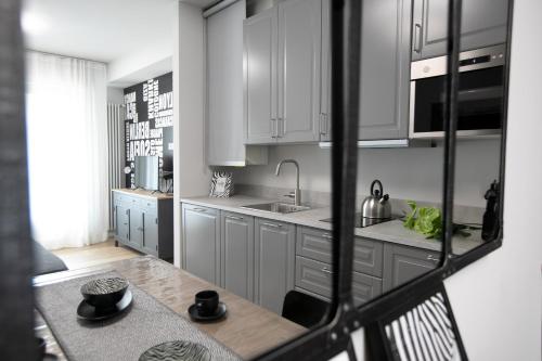 Donizetti Residenceにあるキッチンまたは簡易キッチン