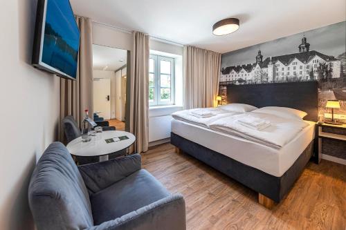 מיטה או מיטות בחדר ב-Lake House Plön