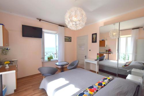 Postel nebo postele na pokoji v ubytování Apartments Margarita