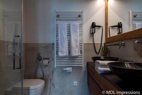 Een badkamer bij Apartments Adlerhorst Top 1