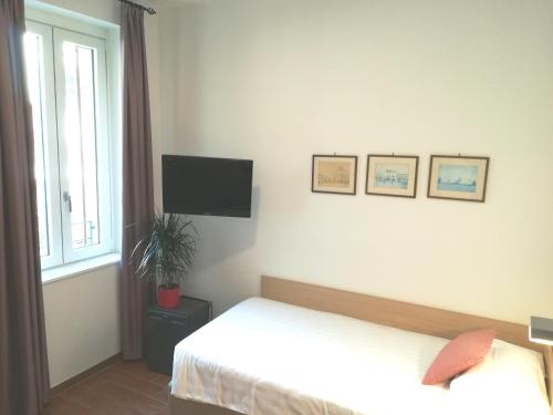 Hotel Quarcinoにあるベッド