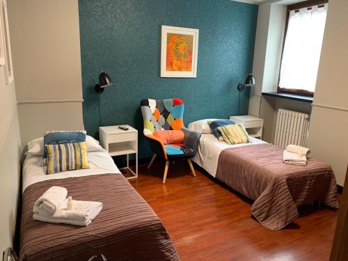 Posteľ alebo postele v izbe v ubytovaní B&B Casanova