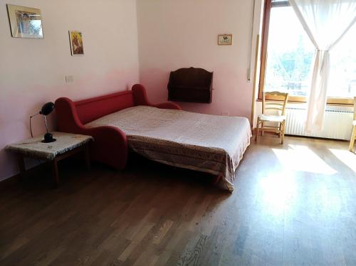מיטה או מיטות בחדר ב-Le Piagge