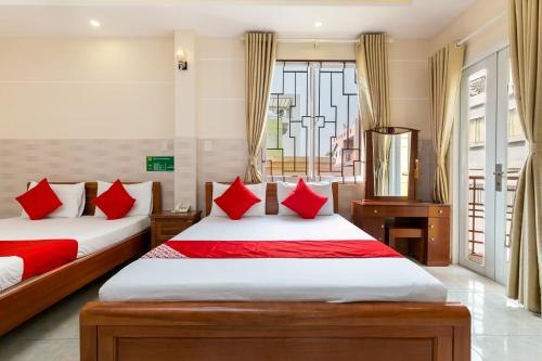 Krevet ili kreveti u jedinici u objektu Ngoc Linh Hotel