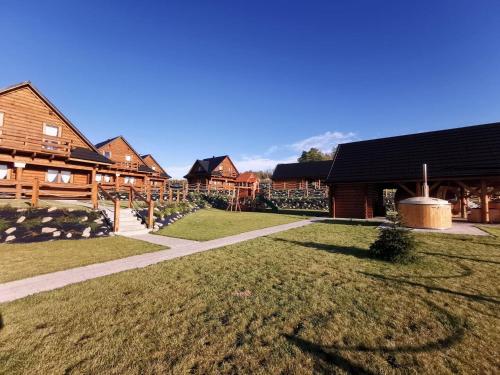 Zahrada ubytování Domki Zagroda Domek z bala z basenem & sauna & balia z hydromasażem
