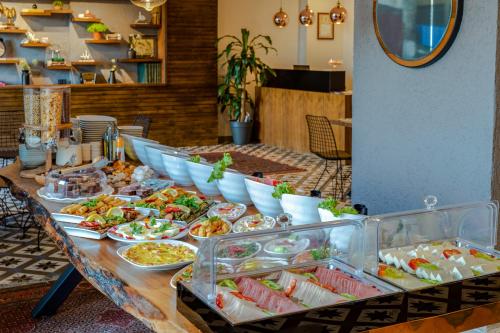 a long table filled with different types of food at DORUK PALAS HOTEL in Istanbul