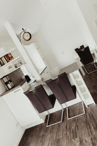 Kuchyň nebo kuchyňský kout v ubytování Apartment Strandnüst