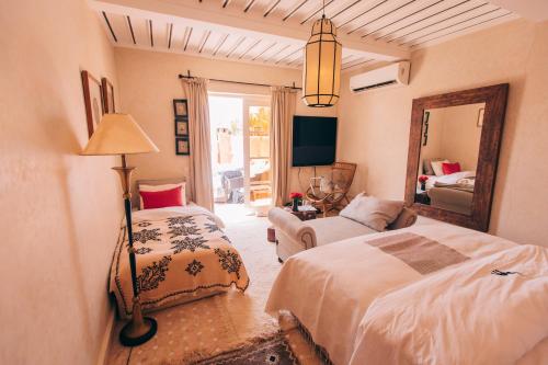 เตียงในห้องที่ Indian Palace