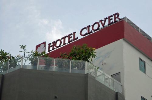 a building with a sign on the side of it at Hotel Clover 5 HongKong Street (SG Clean) in Singapore