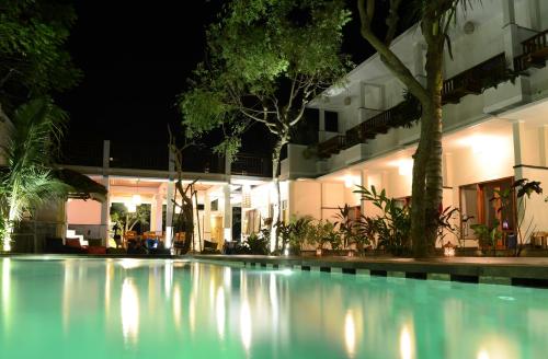 Πισίνα στο ή κοντά στο Arjuna Homestay