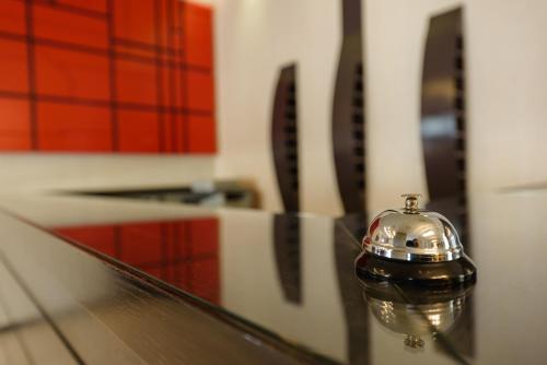 a glass container sitting on top of a counter at Park Hotel in Nafplio